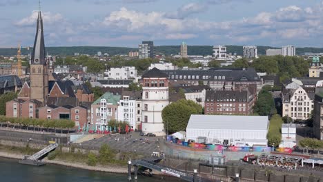 historical landmark, old church and traditional buildings on waterfront