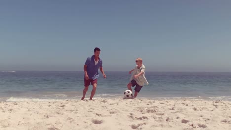 Father-and-son-playing-soccer