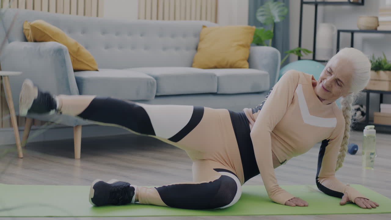 Senior Woman Doing Leg Raises at Home