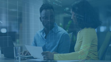 reviewing financial documents, business professionals in office with data animation overlay