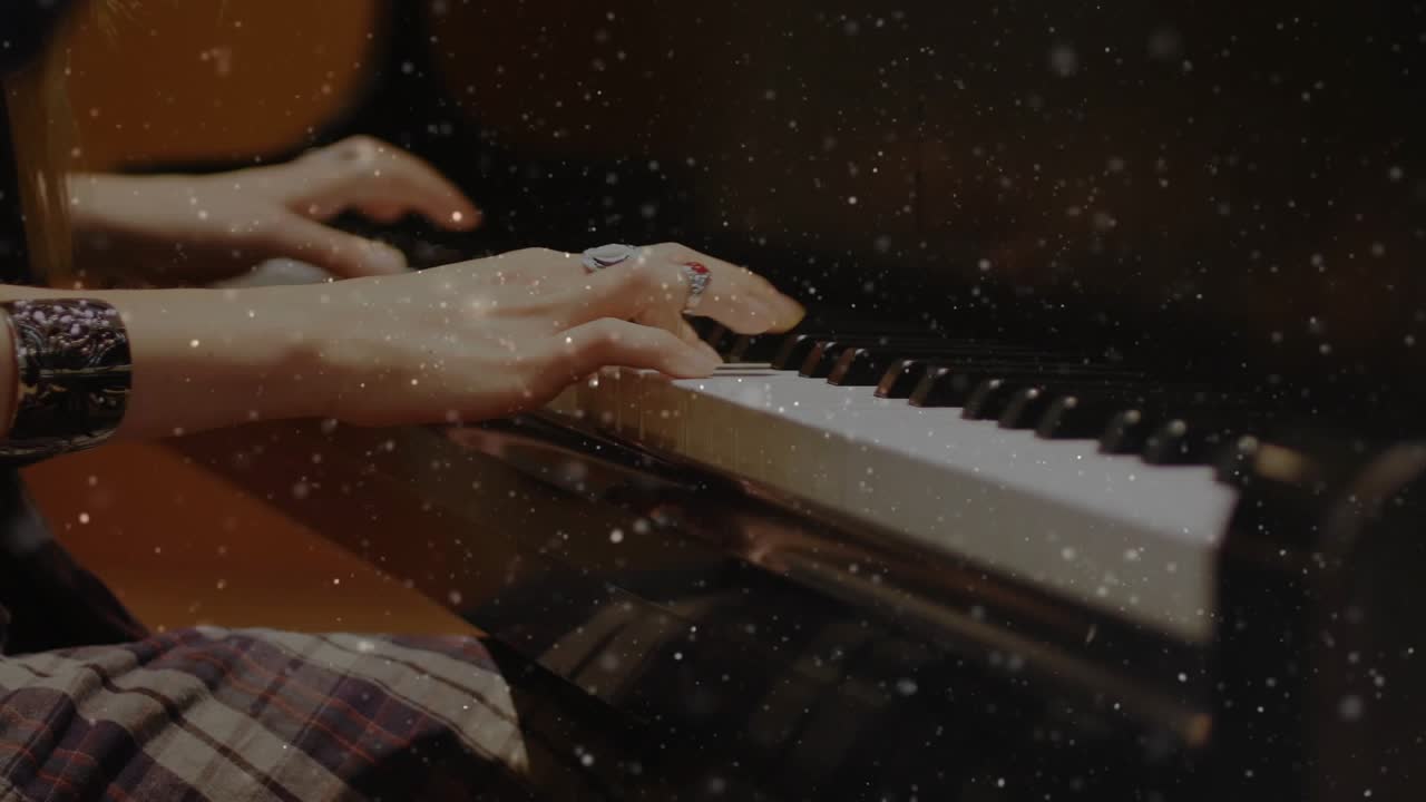 Pianist resting above keys, pressing key, hands flowing as grain overlay showing rings for music
