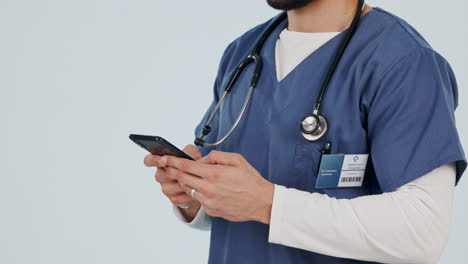 Doctor,-man-and-hands-with-phone-in-studio