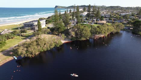 scenic lake ainsworth in lennox head, nsw, australia - drone shot