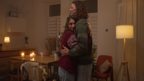 couple celebrating christmas at home