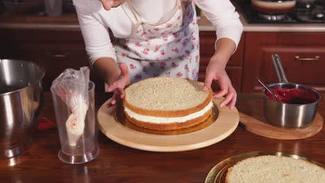 woman baking a layer cake