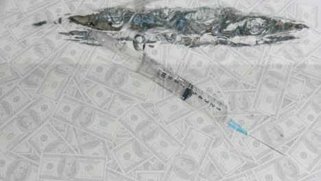 Animation-of-a-syringe-falling-into-water-over-multiple-American-dollar-bills