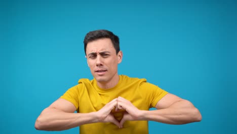 man expressing various emotions with hand gestures
