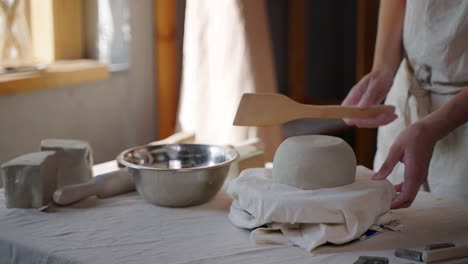 artisan creating a ceramic bowl