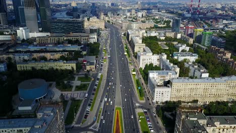 aerial view of a city street with traffic and urban architecture