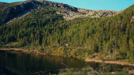 Alpine-Mountain-Over-Calm-Lakes-In-Summertime