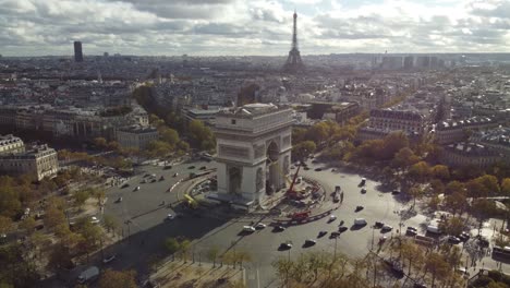 drone view of the famous arc de triomphe in paris.