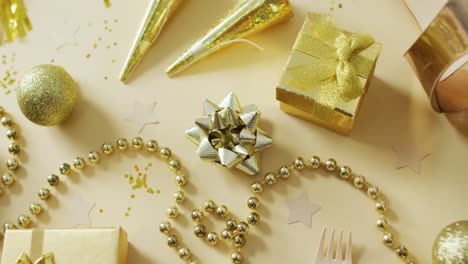 shoes, decorations and stars on yellow background at new year's eve