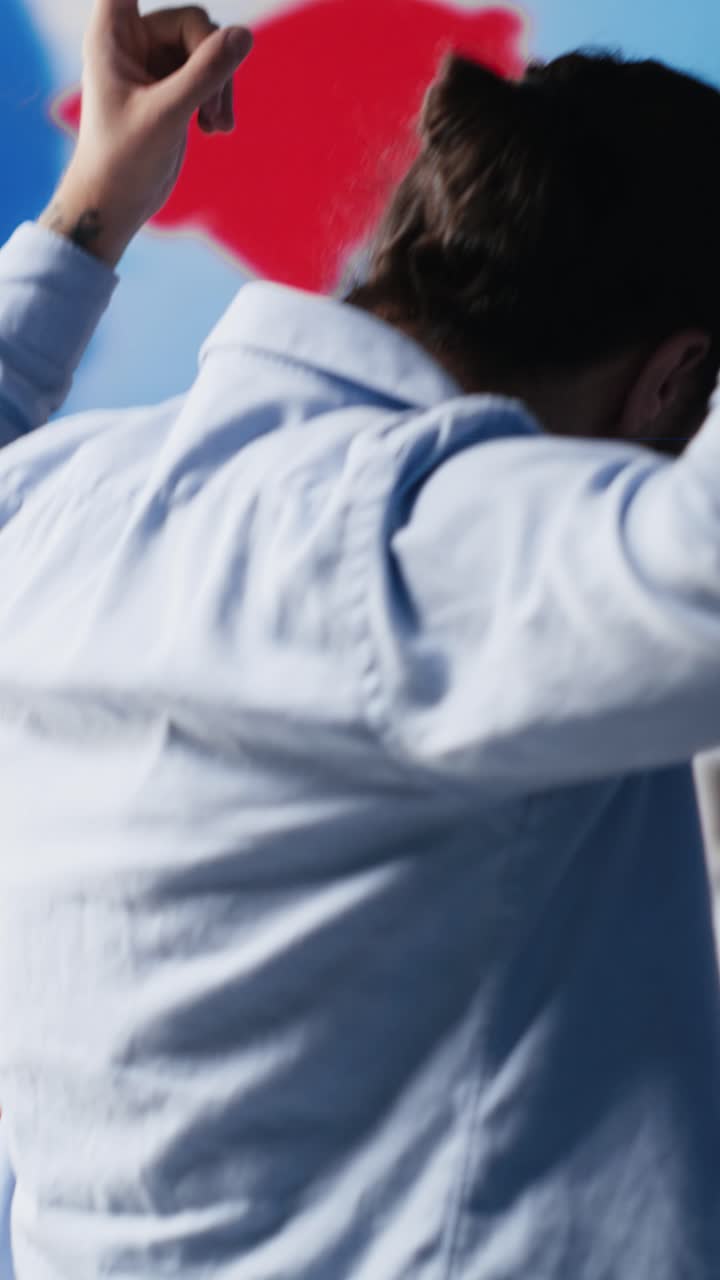 Vertical Video Determined guy admires social media visuals and user interface elements