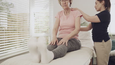 physical therapy session for elderly woman