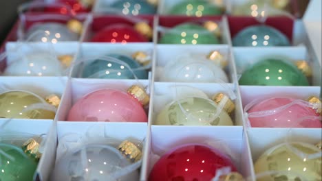 colorful christmas tree balls stored in a box after the holiday