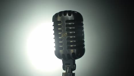classic retro microphone shining in soft light, perfect for capturing the essence of music and performance, evoking nostalgia and timeless expression