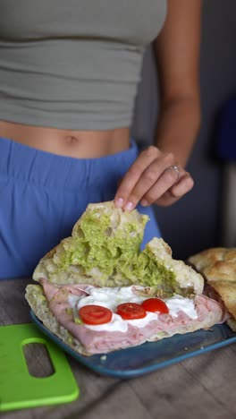 woman preparing food and wearing crop top