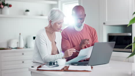 senior couple, bills and documents on computer