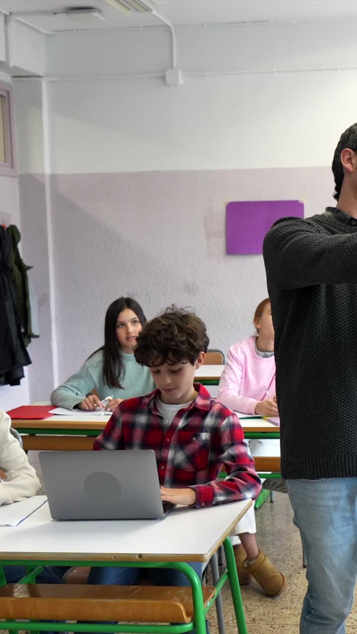 Teacher Explains Geography with Globe to Students