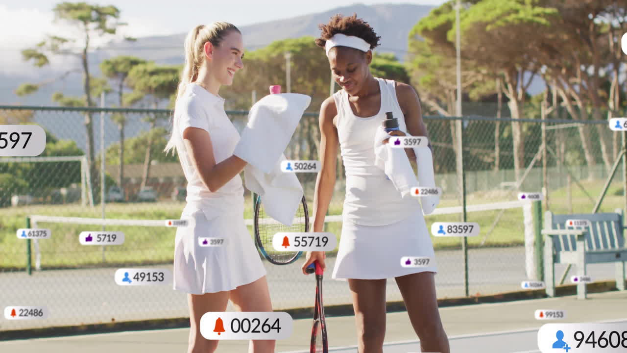 Two women pausing tennis match on outdoor court, showcasing sports marketing notification graphics