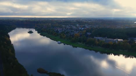 Zoom-in-at-provincial-Baltic-town-Birstonas-in-Lithuania-next-to-river-during-sunrise-in-autumn