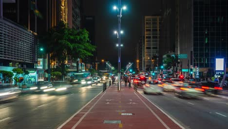 night timelapse view of rush hour traffic on paulista avenue in sao paulo, brazil