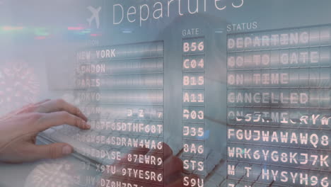 animation of hands of woman using keyboard over departures table and virus cells