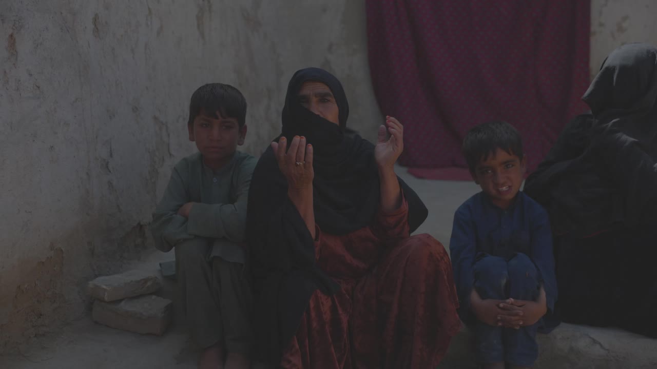 Woman and Children in a Rural Setting