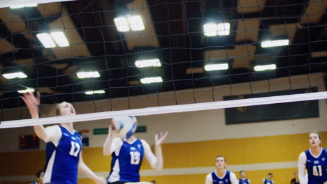 female volleyball players in action during a game