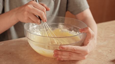 mixing ingredients for a cake or pastry