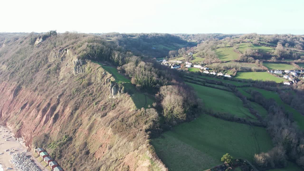 A scenic aerial perspective of the dramatic cliffs and lush greenery in England.