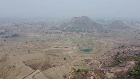 Drone-video-shot-of-vast-area-after-harvesting-in-plateau-region