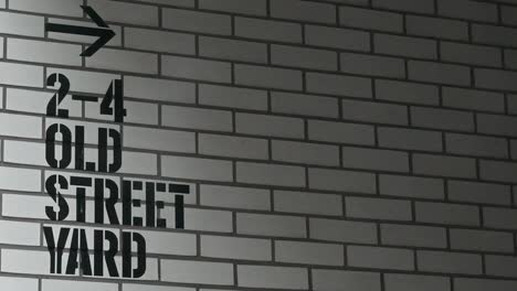 2-4 old street yard - brick wall sign
