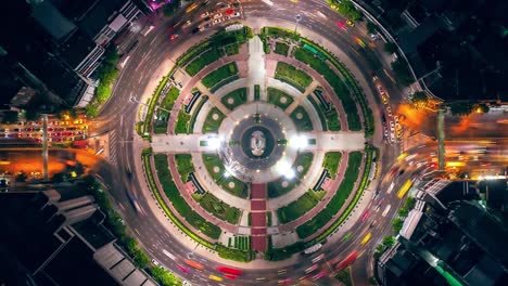 4k time lapse, aerial top view traffic road roundabout in city at night, time lapse top road in bangkok.