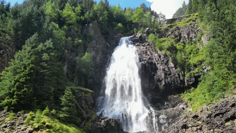 Espelandsfossen-Waterfall-Cascade-in-Granvin,-Odda,-Norway,-Scandinavia---Tilt-Down