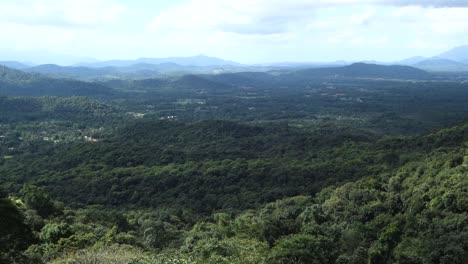 mountainscape-with-immense-lush-tropical-rainforest-in-Brazil,-trucking-shot