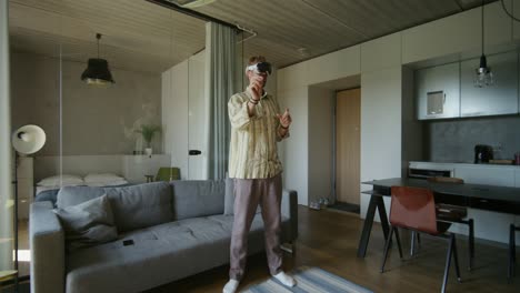 man using vr headset in modern apartment