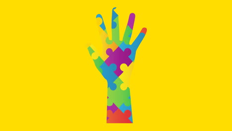 animation of colourful hand of puzzle on yellow background