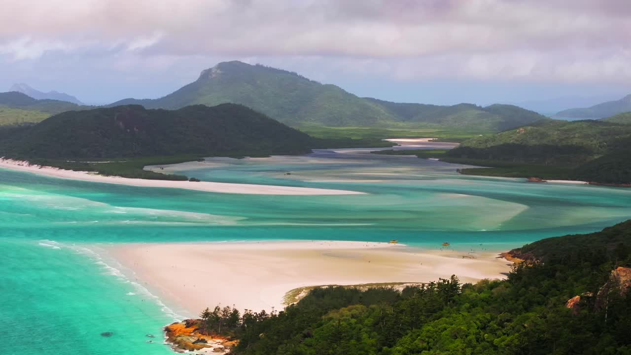 Whitsundays Islands Whitehaven Beach North end Hill Inlet Lookout aerial drone picturesque sandy National Park view sunny clouds summer spring scenic flight clear blue waters parallax static shot