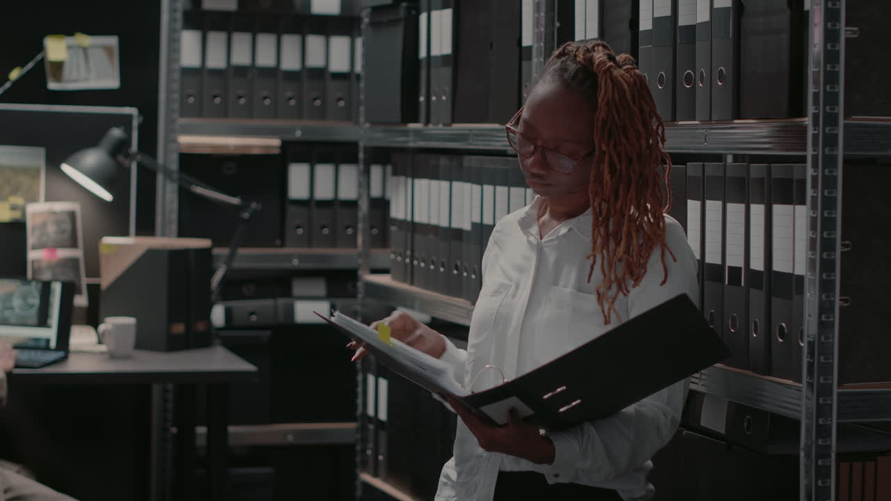 Detectives Working on Investigation in Office