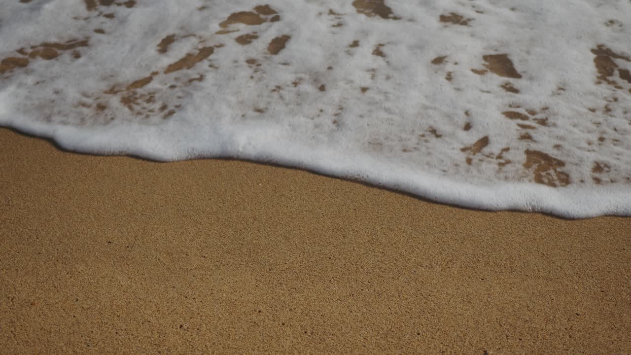 Surfer man walking to the beach at sunset preparing for surfing training and search for waves in Barcelona, spain, water, ocean exercise in sea with board, athletic male holiday or travel in vacation