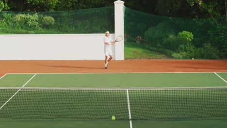tennis players playing a point