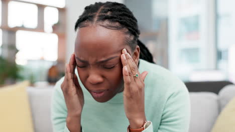 Stress,-headache-and-black-woman-on-a-sofa