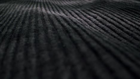 close-up of dark ribbed fabric texture