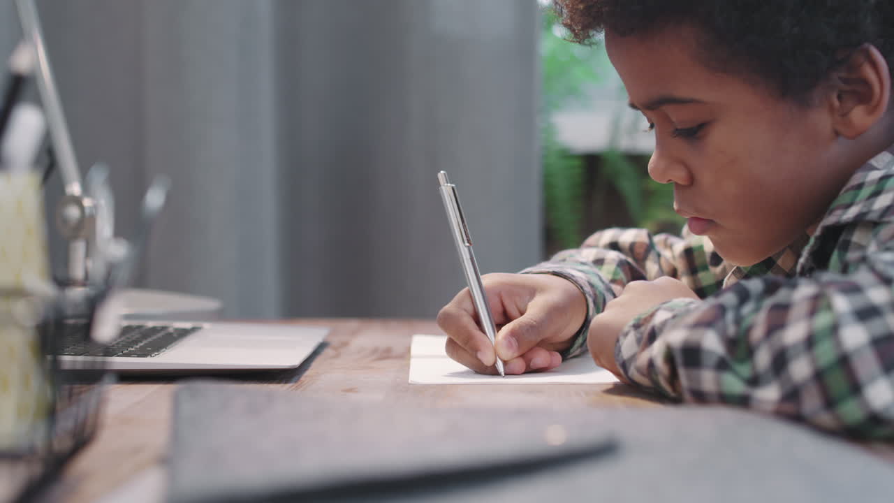 Cute Little Afro Boy Doing Homework
