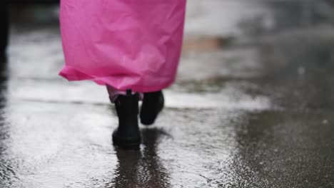 woman walking in the rain