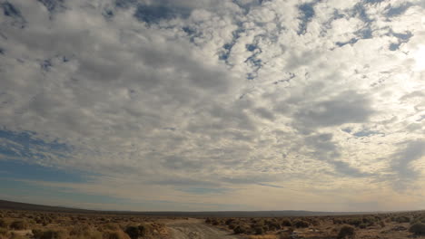 Off-road-four-wheeling-along-the-dusty-trails-of-the-Mojave-Desert---driver-point-of-view