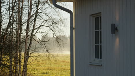 time lapse of morning fog moving at nordic countryside home