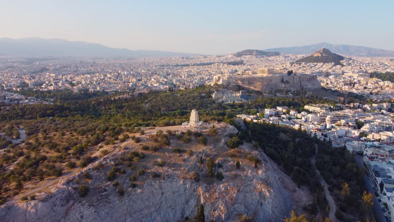 Aerial drone view of the 7 hills of Athens with the ancient Acropolis and Filopappou Hill, Attica, Greece