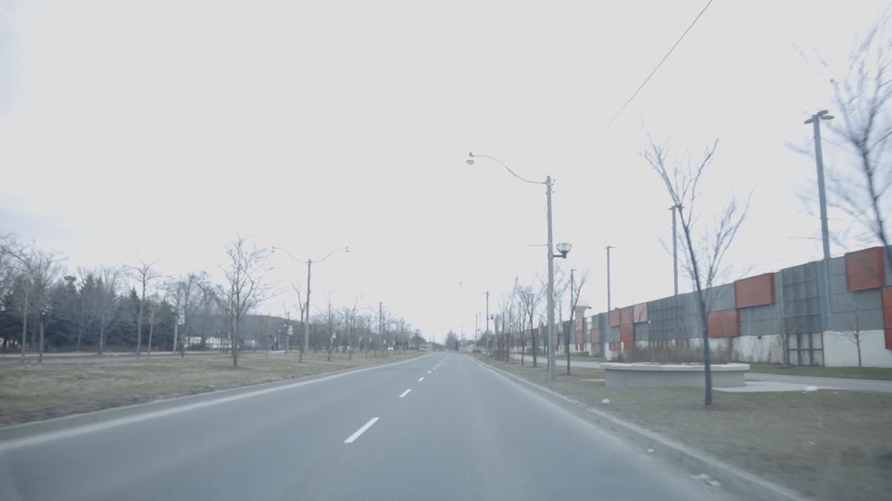 Driving The Car On An Empty Asphalt Road Under The Dramatic Sky - Wide Shot